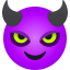 smiling face with horns